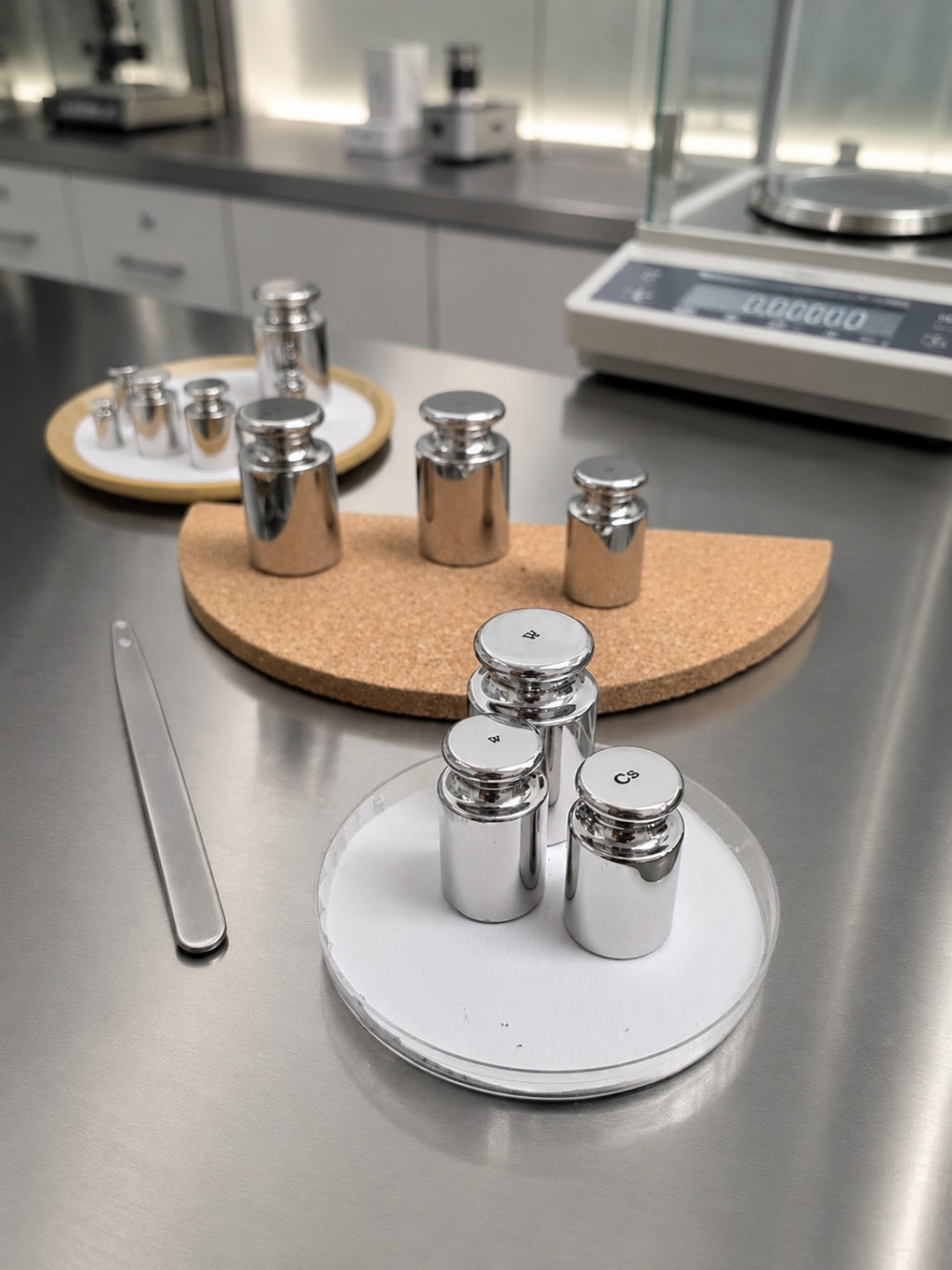 INSCO calibration weights in a laboratory. Representative selection image; refer to product specifications for mass range and accuracy class.