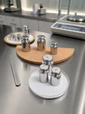 INSCO calibration weights in a laboratory. Representative selection image; refer to product specifications for mass range and accuracy class.